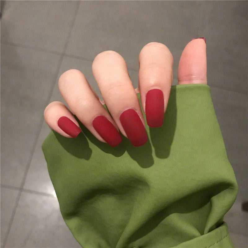 Finished Manicure with False Nails