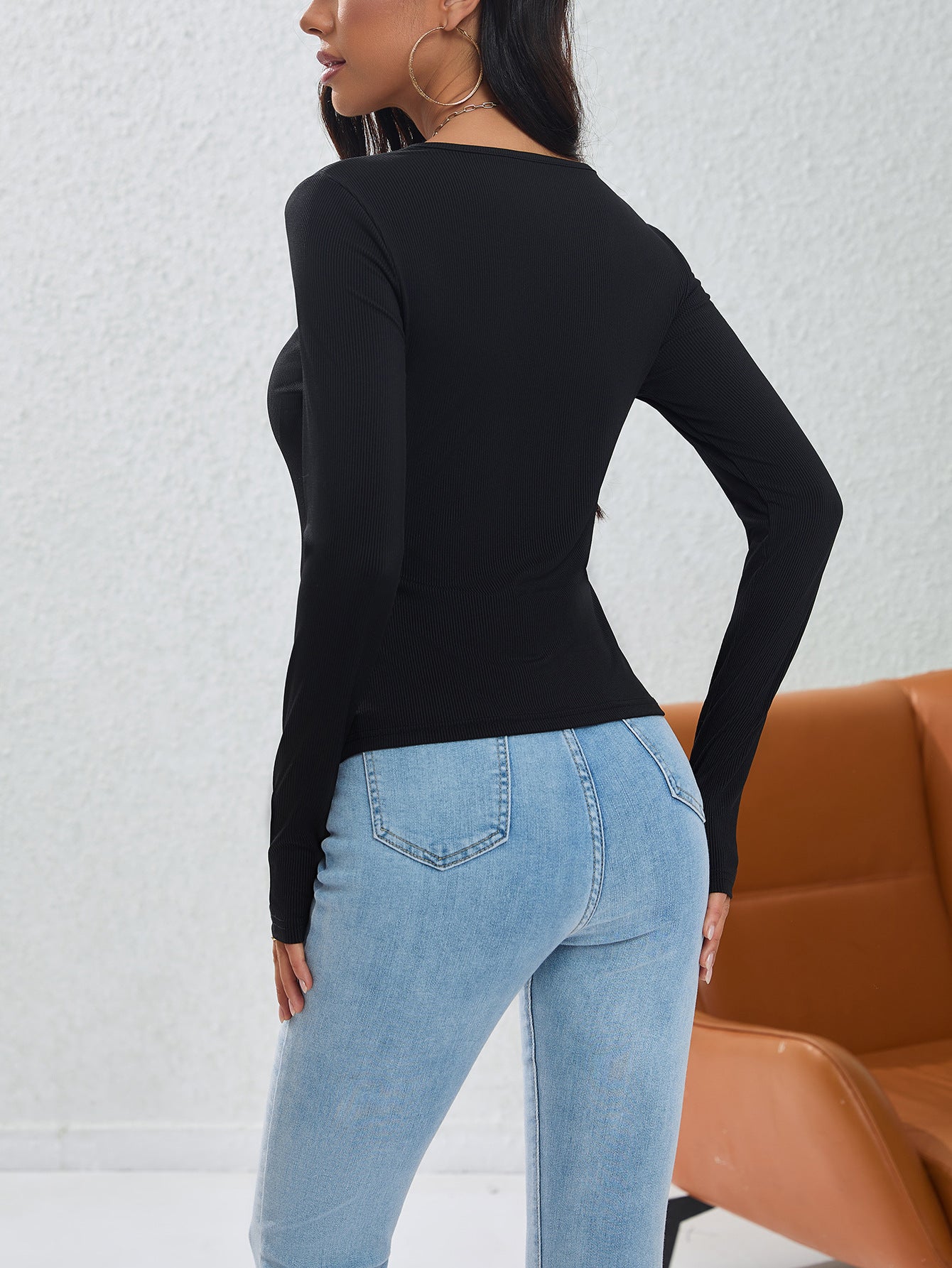 Irregularly Arranged Buttons Create A Sophisticated Top