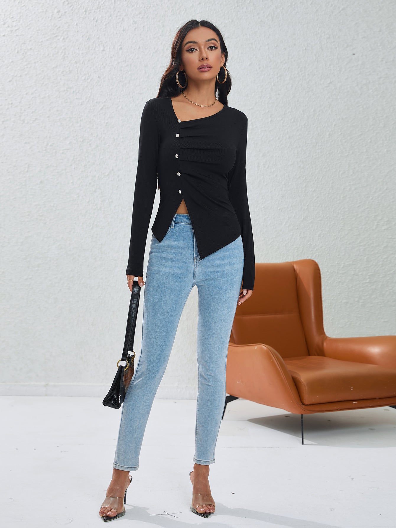 Irregularly Arranged Buttons Create A Sophisticated Top