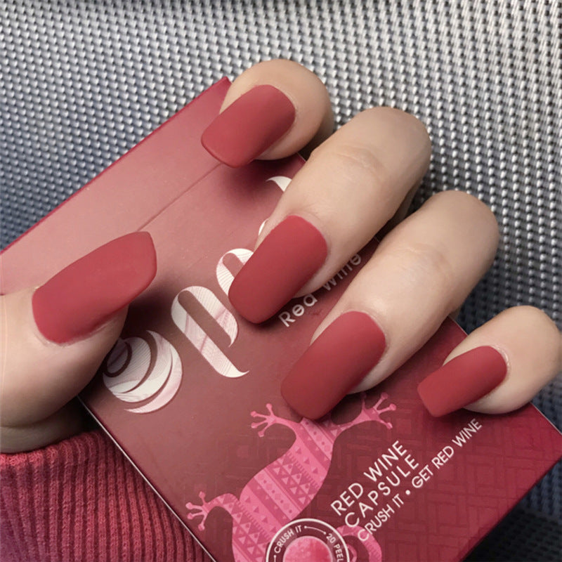 Finished Manicure with False Nails