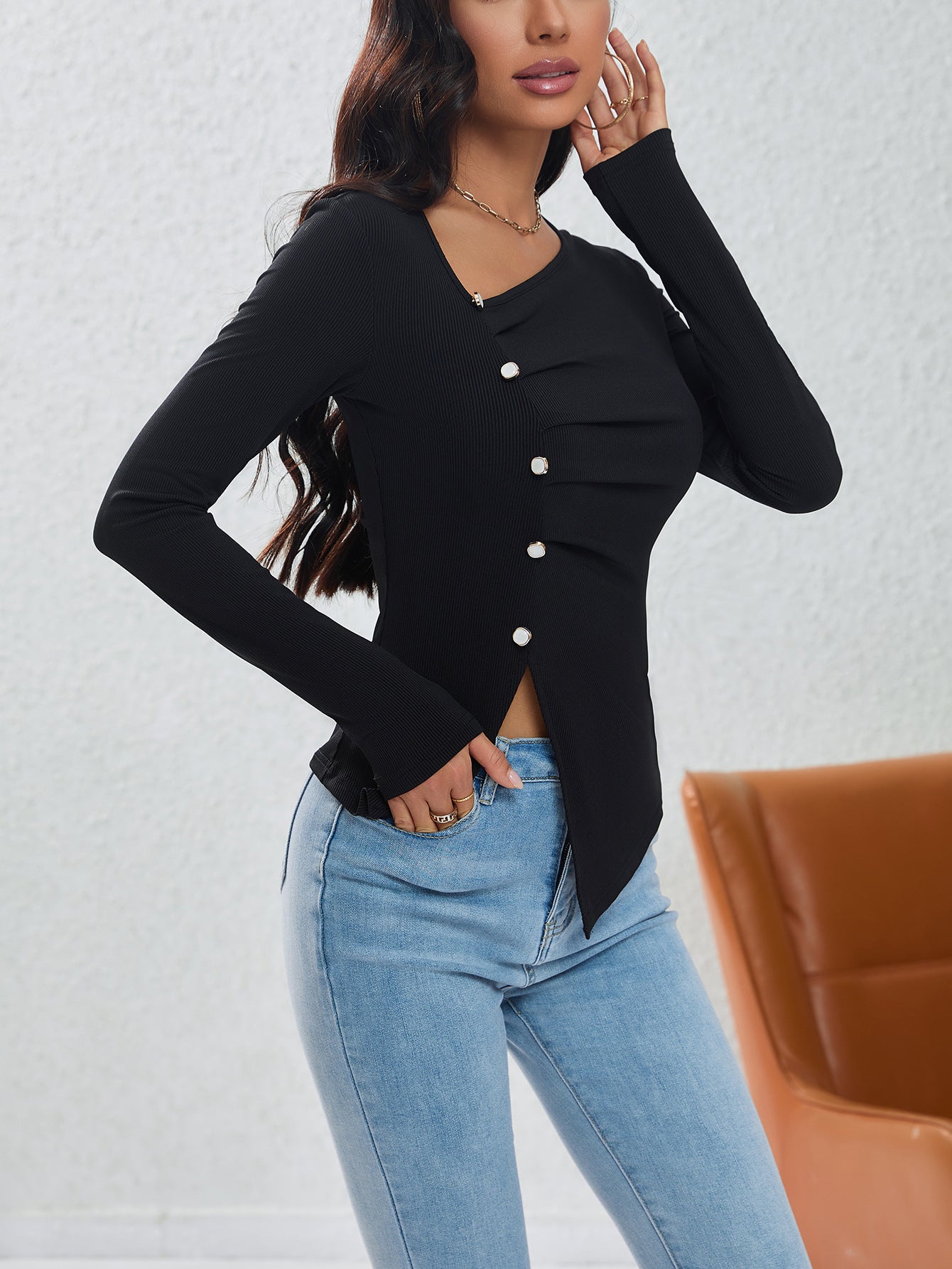 Irregularly Arranged Buttons Create A Sophisticated Top